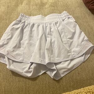 Lululemon size four Hotty hot 2.5 inseam. Light purple/ lilac. Worn 5-10 times